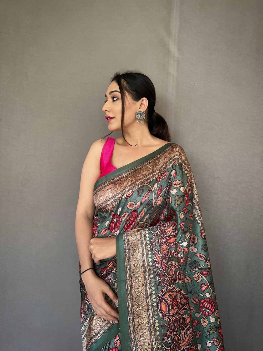 Emerald Green Digital Print Silk Saree – Floral Zari Border with Pink Tassels